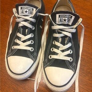 Converse women’s or men’s size 9/7 Black and White Sneakers